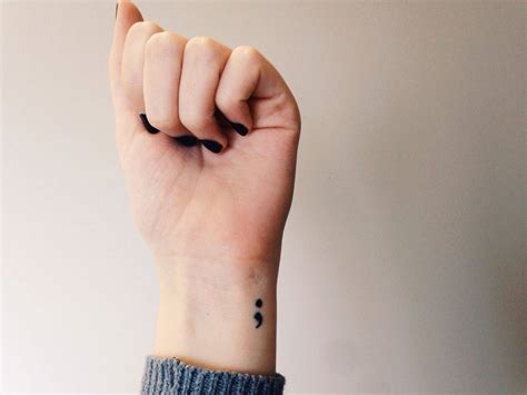 semicolon tattoo meaning on wrist.